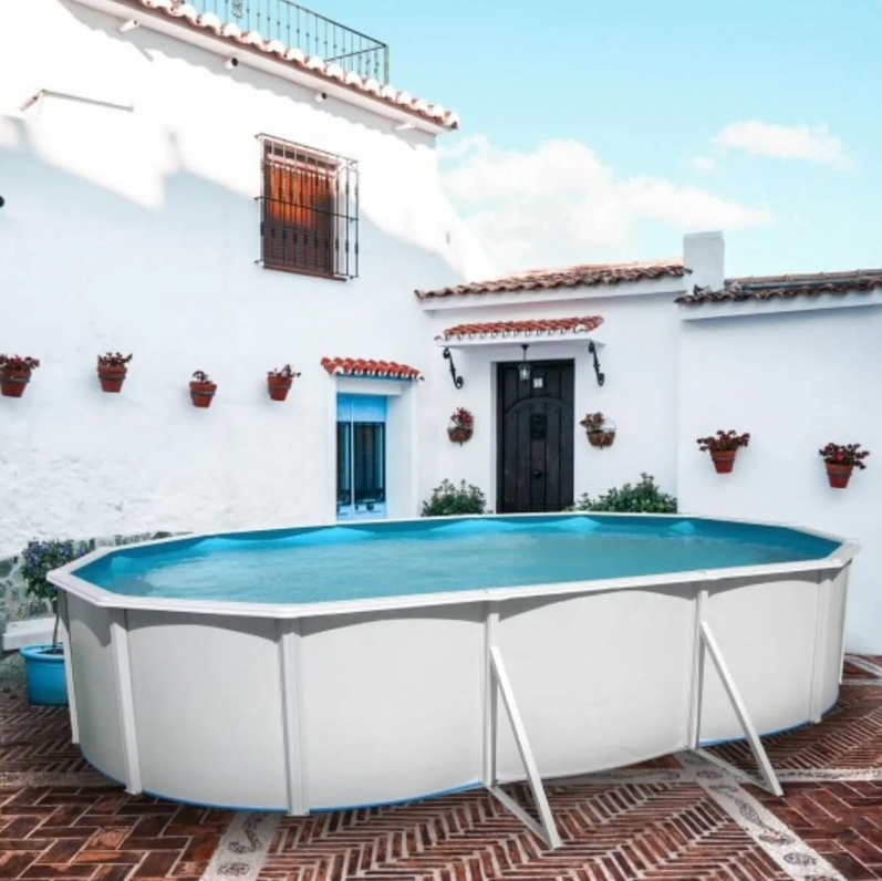 Piscina Acero Ovalada Filtración Monobloc 300 y escalera QP
en jardín 